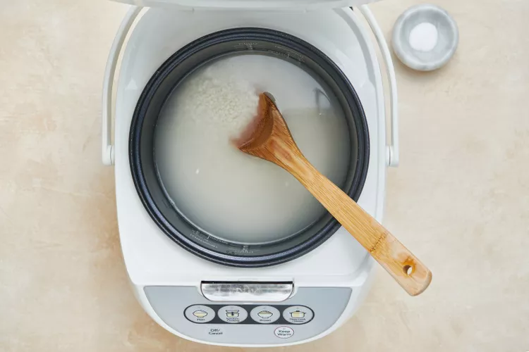 Add Water to the Rice Cooker - how to make sticky rice in a rice cooker